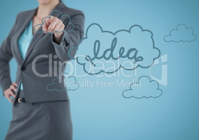 Business woman mid section pointing at blue idea graphic against blue background