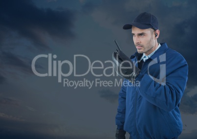 Security man outside with blue background cloudy sky