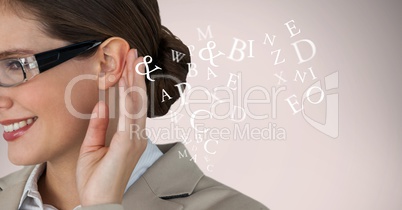 Cropped image of businesswoman listening alphabets