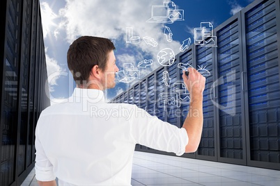 Businessman is drawing against database background