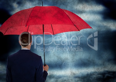 Back of business woman with umbrella in against storm with grunge overlay