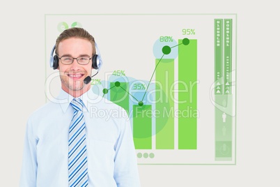 businessman wearing Head set against graphics background