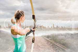 archer is shooting an arrow against city scape background