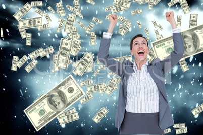 business woman expresses her joy against falling money background