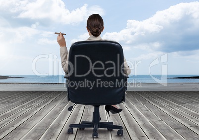 Businesswoman Back Sitting in Chair with cigar and sea view