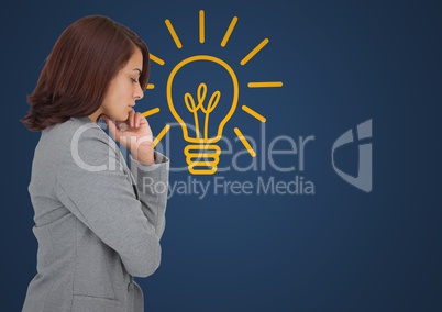 Business woman thinking against blue background with yellow lightbulb