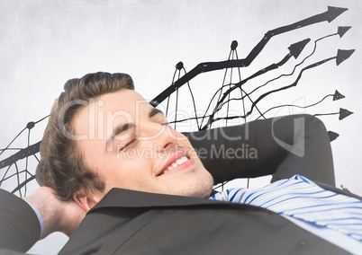 Business man lying back against graph doodle and white background