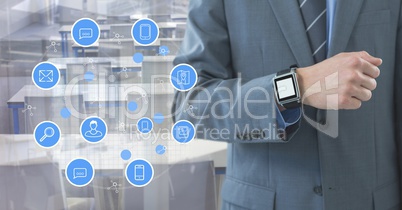 Businessman with watch and apps with desks