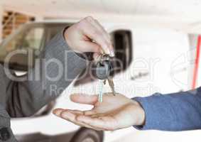 giving keys of the car after handshake.