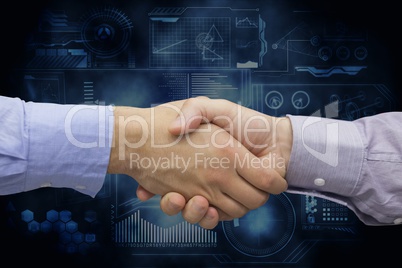 Handshake between two businessmen against digital graphics background