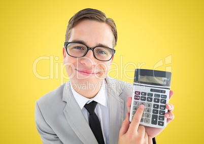 Man looking up with calculator against yellow background