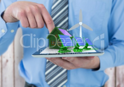 solar panels, grass house with solar panel and windmill  on tablet