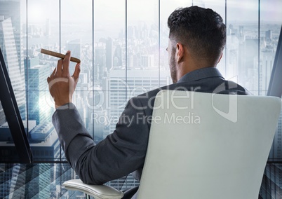 Businessman Back Sitting in slick Chair with  cigar and window overlooking modern city