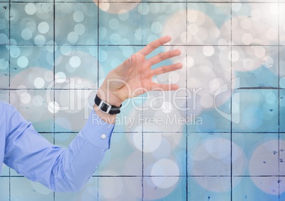 Hand reaching open with sparkling light bokeh background