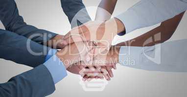Business hands together with white lightbulb graphic