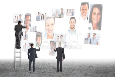 Businessman in front of digital screen