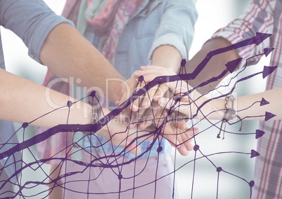 Close up of team with hands together and purple graph