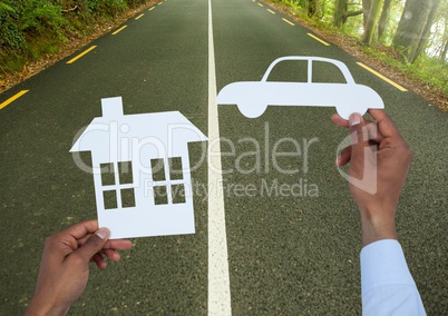 Cut outs house and car on road