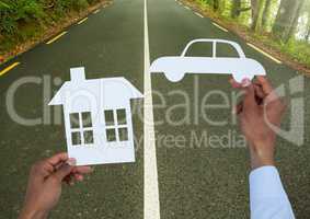 Cut outs house and car on road