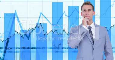 Digital image of thoughtful businessman standing against graphs