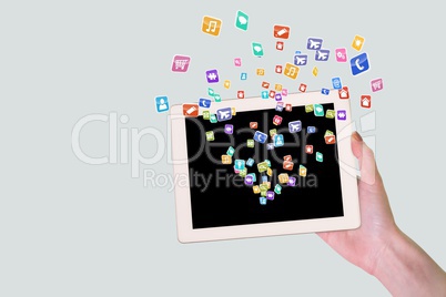 Hand holding a tablet with digital app