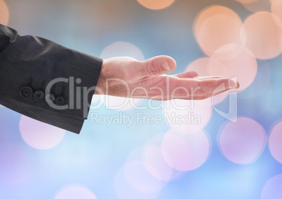 Hand open with sparkling light bokeh background