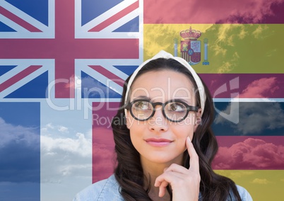 main language flags overlap with sky around thoughtful woman