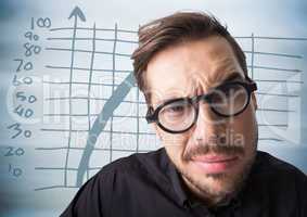 Close up of confused man with glasses against blue graph and blurry blue wood panel