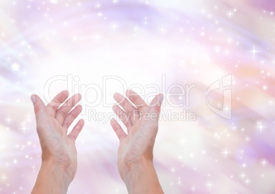 Hands holding invisible space with sparkling light bokeh background