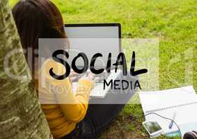Social media text and white box against woman with laptop under tree
