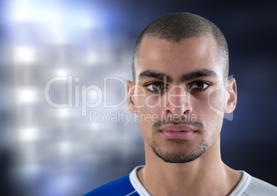 foreground of a soccer player with lights background