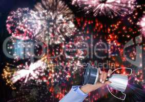 business hand with trophy. Red fireworks
