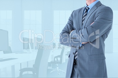 Businessman crossing his hands in office