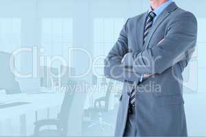 Businessman crossing his hands in office