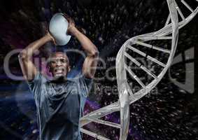 rugby player with ball, iron dna chain and black background