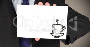 Business man mid section with card showing brown coffee doodle against brown background