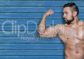 fitness man with blue wood background