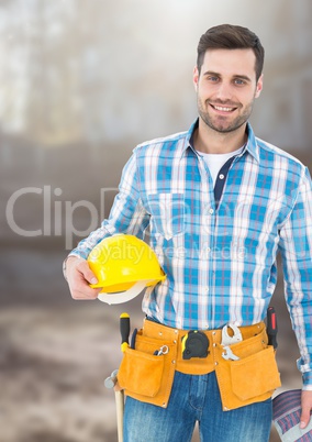 Construction Worker in front of construction site