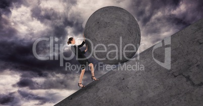 Businesswoman pushing a 3D stone ball above her