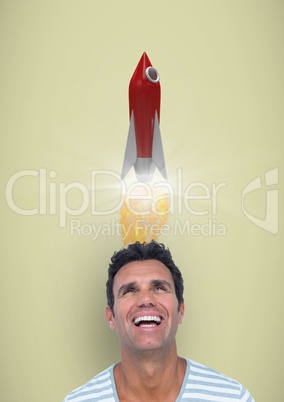 Digital image of man having rocket launch over head against yellow background