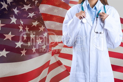 Woman doctor in front of american flag Woman doctor in front of american flag