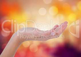 Hand posture curved with sparkling light bokeh background
