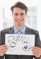 Grey arrow doodles on card held by business man smiling