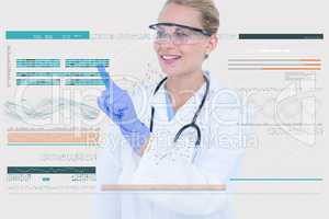 Woman doctor interacting with a digital screen