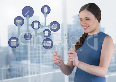 Businesswoman holding glass screen with business icons
