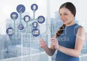 Businesswoman holding glass screen with business icons