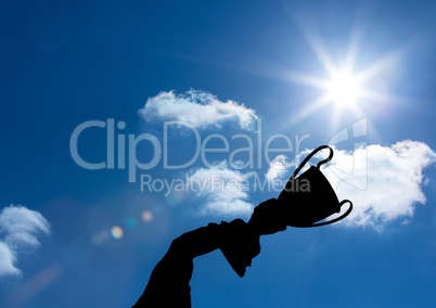 business hand  with trophy shade in the sky