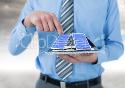 solar panel on hand of businessman