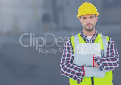 Construction Worker in front of construction site