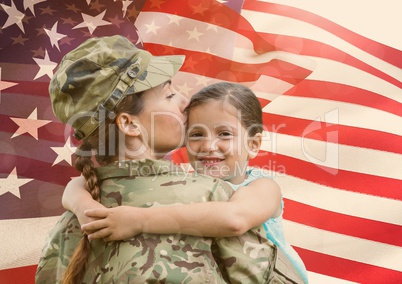 woman soldier with daughter in front of usa flag